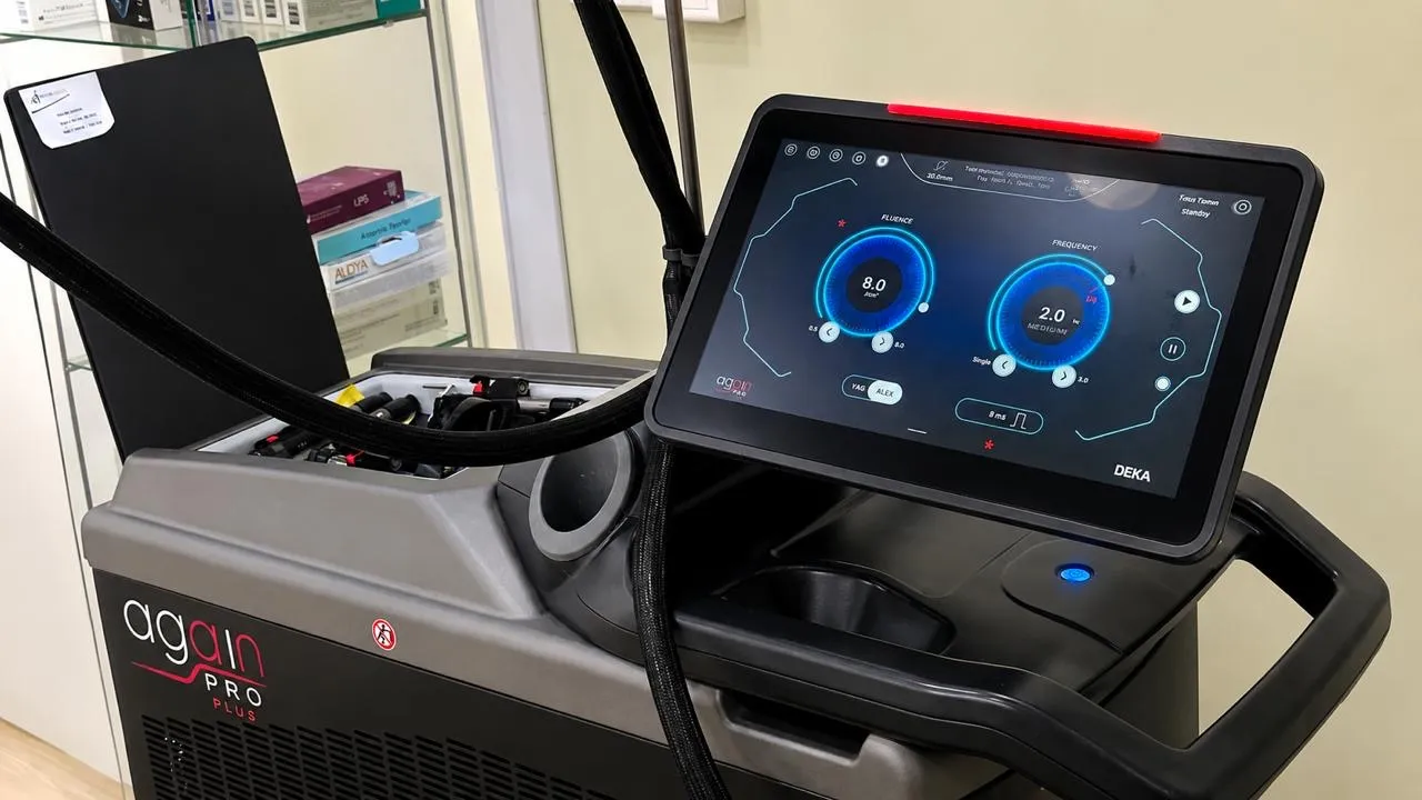 The AGAIN PRO PLUS control screen showing treatment settings